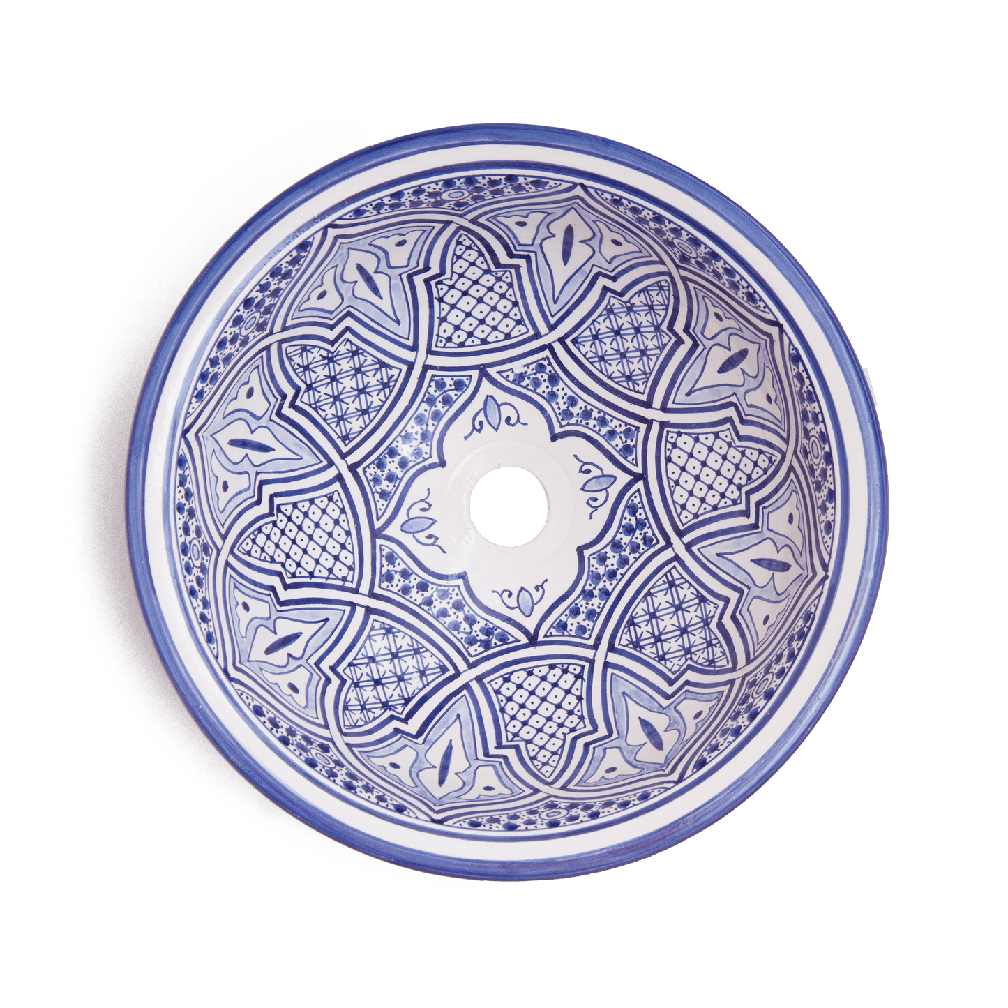Top-down view of vessel sink interior displaying detailed blue star and geometric medallion design