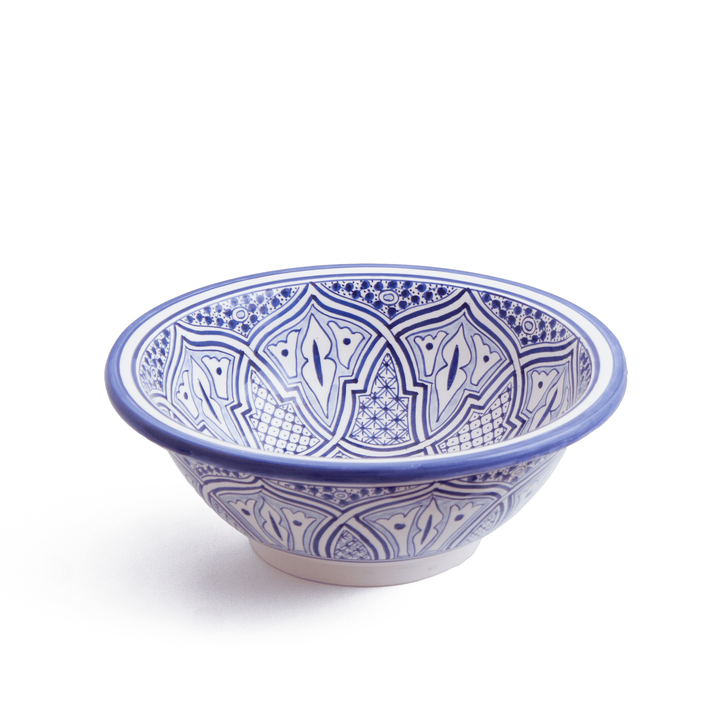 Angled perspective of blue and white ceramic basin showcasing intricate Moroccan geometric patterns