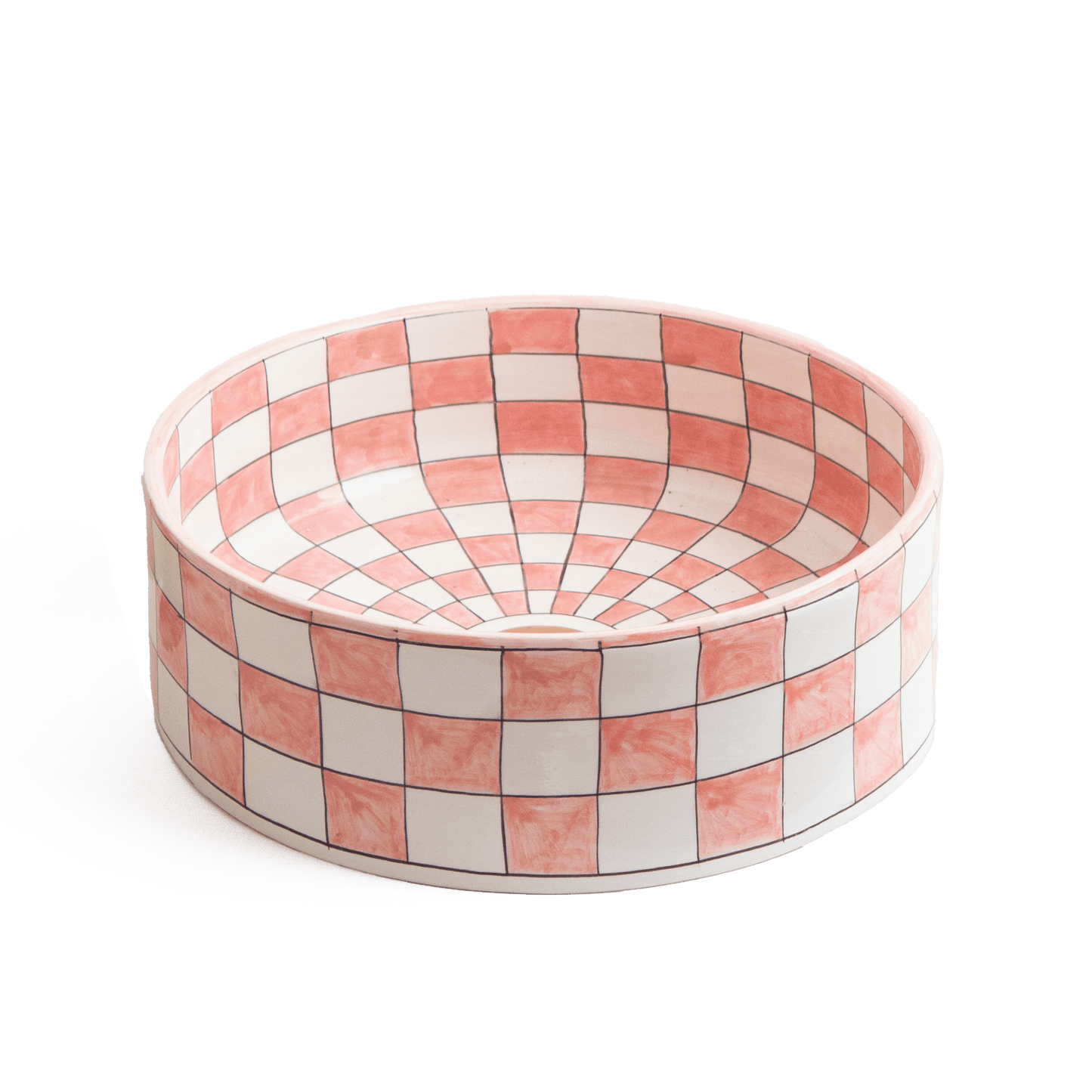 Three-quarter perspective view of ceramic vessel sink with pink and white checker pattern on white background showing complete bowl shape