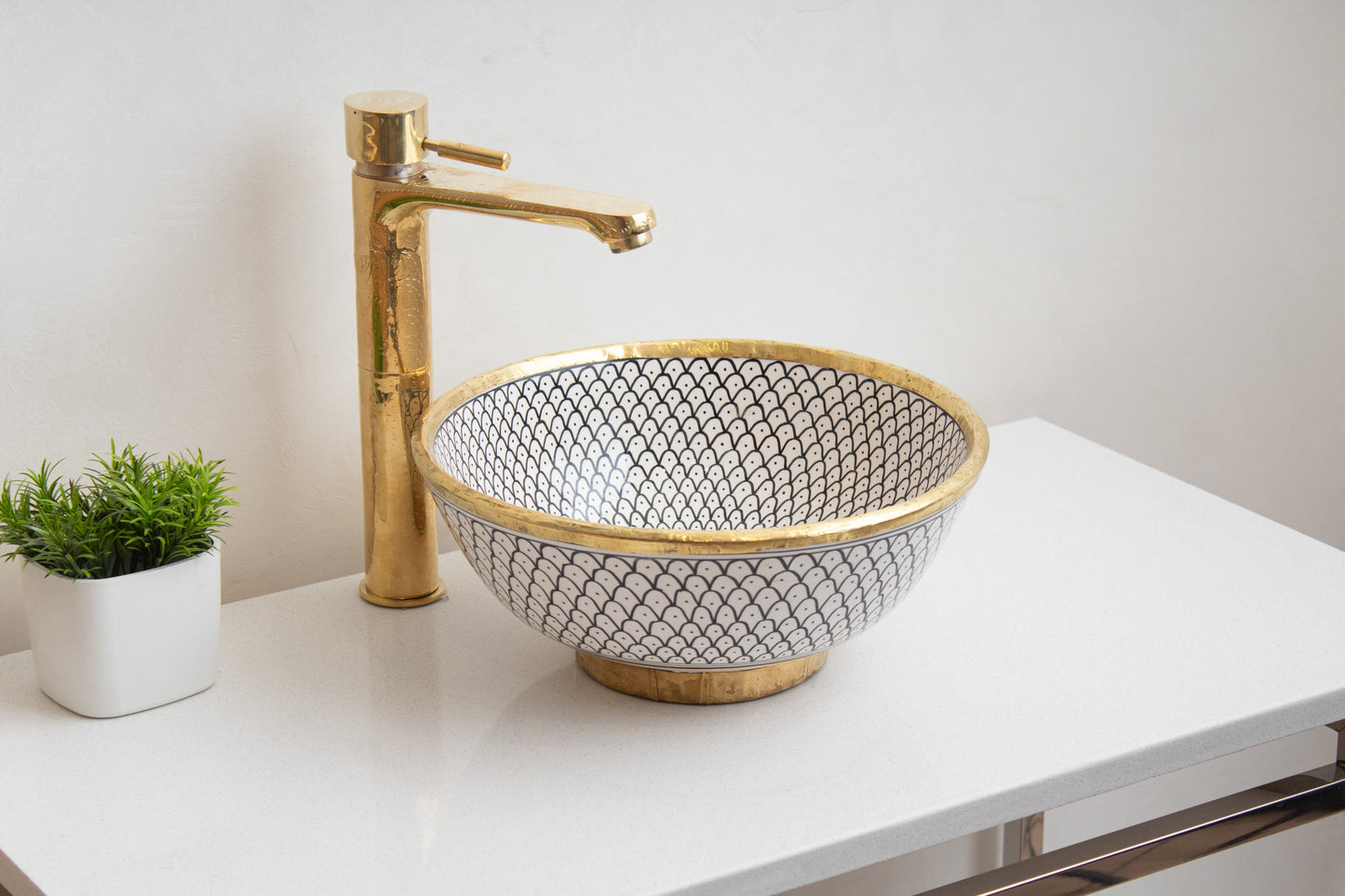 round fishscale ceramic sink with faucet front view