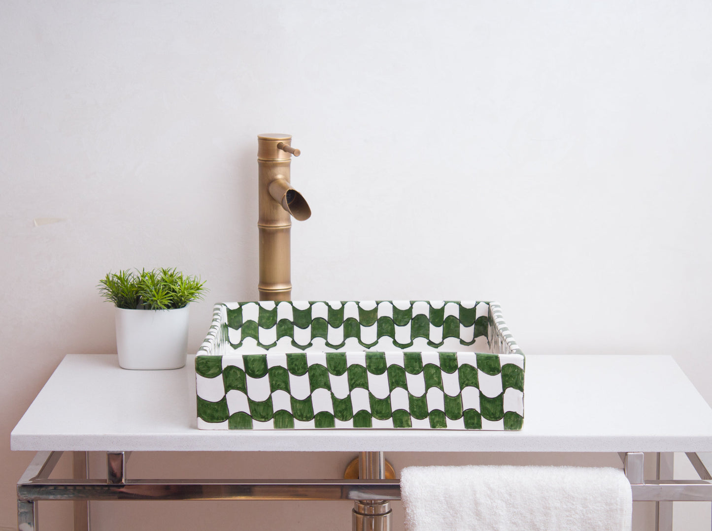 Side profile view of square ceramic vessel sink showing geometric pattern border and modern bathroom installation