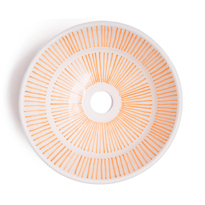 Overhead view of Moroccan round ceramic basin displaying full radial sunburst pattern with central drain opening