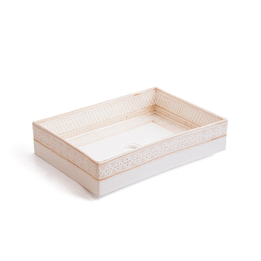 Angled perspective of rectangular ceramic basin showcasing three-dimensional form and pattern depth
