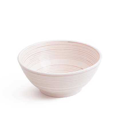 Three-quarter perspective view of cream ceramic vessel sink with spiral ridged texture on white background showing complete bowl shape.