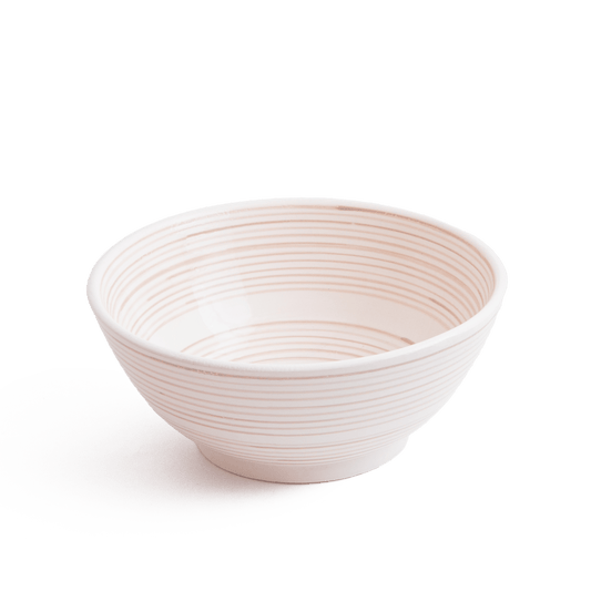 Three-quarter perspective view of cream ceramic vessel sink with spiral ridged texture on white background showing complete bowl shape.